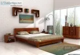 Get New Queen Size bed designs at WoodenStreet
