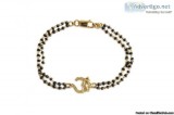 Gold Aum Bracelet On Mangalsutra Chain