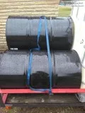 55 gallon black steel drums.