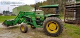 1992 John Deere 2555 tractor with attached bucket