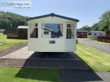 Cheap static caravan for sale sited on Thurston Manor