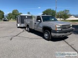 2004 Grey Chevy Silverado work truck with trailer