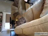 3 seater couch with loveseat and 2 large lamp tables with lamps 