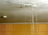 Upstairs bathroom flooded leaking through ceiling