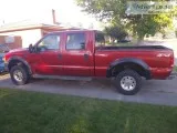 Red Ford Superduty Powerstroke Diesel v8 7.3 L
