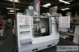 HAAS VF-2SS CNC 4-Axis Vertical Machining Center loaded with fea