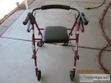 4 WHEEL WALKER WITH SEAT AND BRAKES