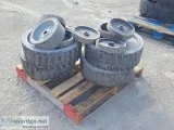 PALLET OF APPROX. (11) RIMS WSOLID TIRES