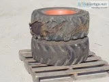 (2) RIMS WFOAM FILLED TIRES fits skidsteer 