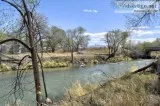 Development potential for this 900 feet River Frontage