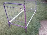 Antique twin iron bed with rails