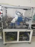 Robot arm and feeder