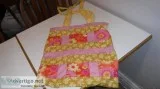 Pink and yellow hand sewn purse for sale
