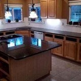 Marios Granite LLC