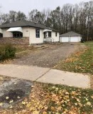 This spacious side by side duplex boasts 3 bedrooms and 1.5 bath