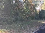 .68 Acres on a busy corner lot on Thompson Bridge Road for sale
