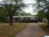 Charming full brick 3 bedroom 2 bath home with a bonus room