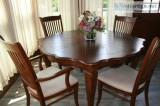 solid wood dining room table with 4 chairs
