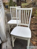 2 sturdy white chairs