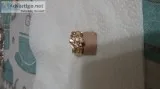 Man s gold nuggett ring with diamonds.