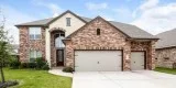 This gorgeous home features wood-style and carpet flooring throu
