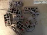 6 Tripp Lite Isobar Surge Protectors and APC Backup unit