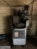 2 old grinder machines