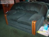 green couch and love seat