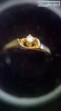 Solid 10K Solitaire diamond ring.