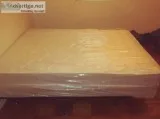 Full size bed boxspring and frame. Brand new in plastic