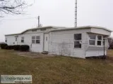    FREE MOBILE HOME WITH PURCHUSE OF 2 CAR GARAGE and ONE ACRE O