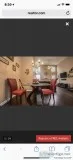 Glass top table and 4 red chairs