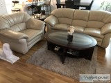 Tan leather sofa and chair coffee table