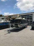 2017 Coach 23 RF Tritoon wHonda 250 and Magic Tilt trailer w bra