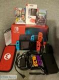 Nintendo Switch with 4 games for sale