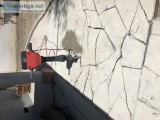 Concrete demolition and dirt removal.