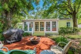 Located in Palma Ceia on an OVERSIZED 100x100 lot is this adorab