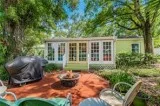 Located in Palma Ceia on an OVERSIZED 100x100 lot is this adorab