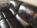 Powered and reclining leather sofa and recliner