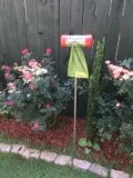 Home dog poop bag dispenser for the yard