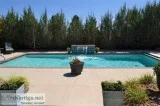 Beautiful landscaped home with pool