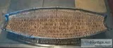 Woven Wicker and Metal Canoe Shaped Basket