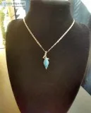 TurquoiseTopaz 925 sterling silver necklace with 16 inch chain..