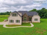 Beautiful All Brick Home situated on more than 2 acres of privat