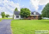 Check out this beautifully kept house wa large lot
