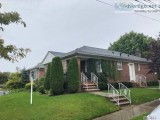 ID  (COM) Sunny and Spacious Brick Ranch in Bayside.