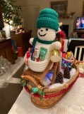 Christmas snowman on sleigh