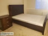 Selling wood bed frame of double-bed size with two wood drawers 