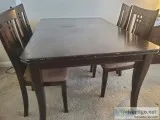 Selling dining set (dining table plus four chairs). Table length