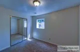 remarkable home greets you with a paved decorative